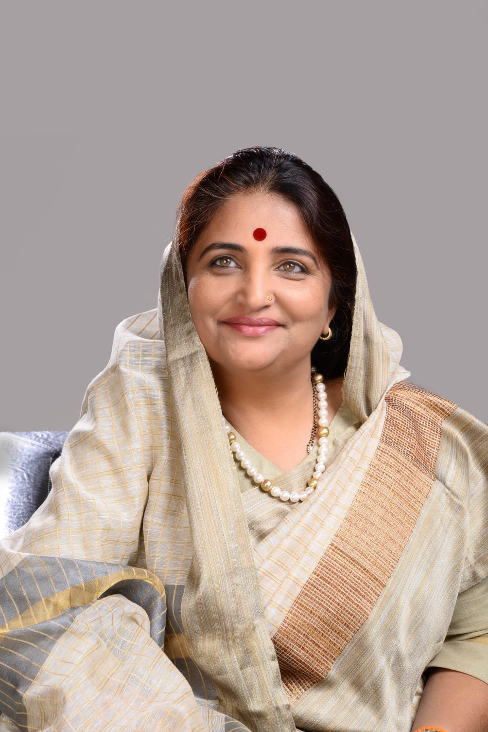 अ