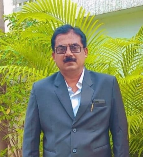 अ