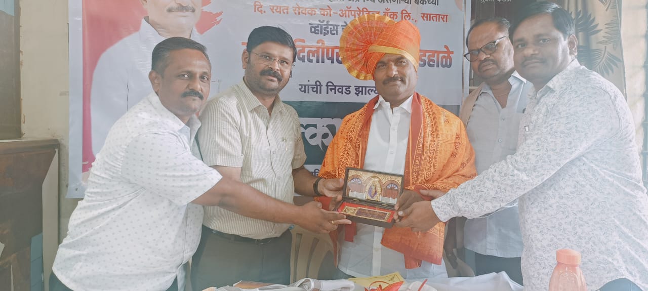 अ