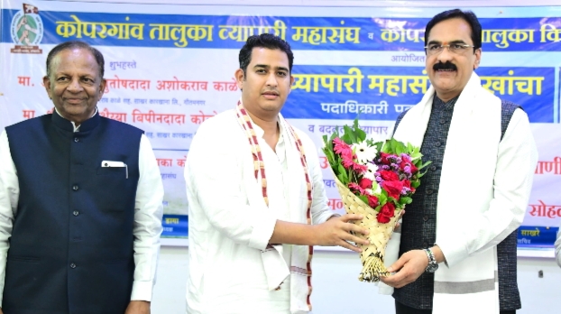 अ