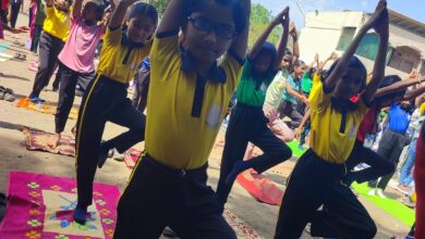 इ