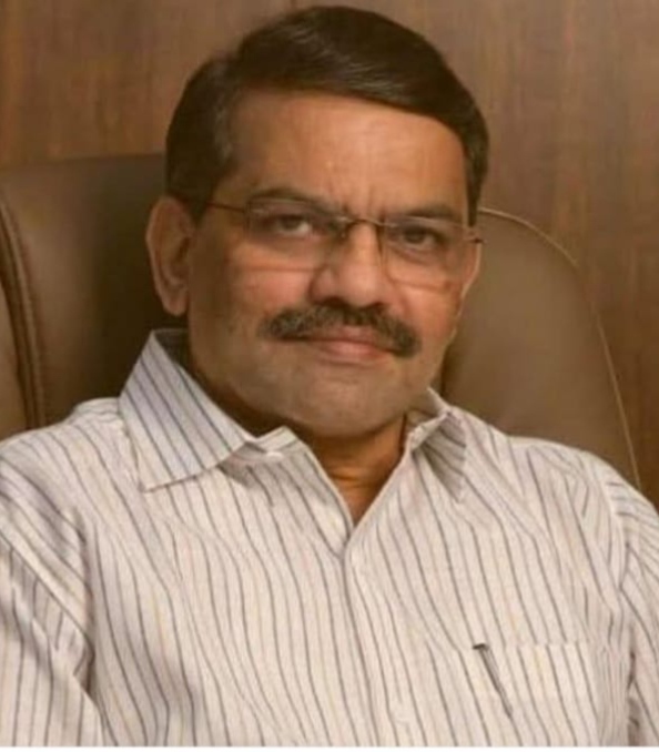 अ